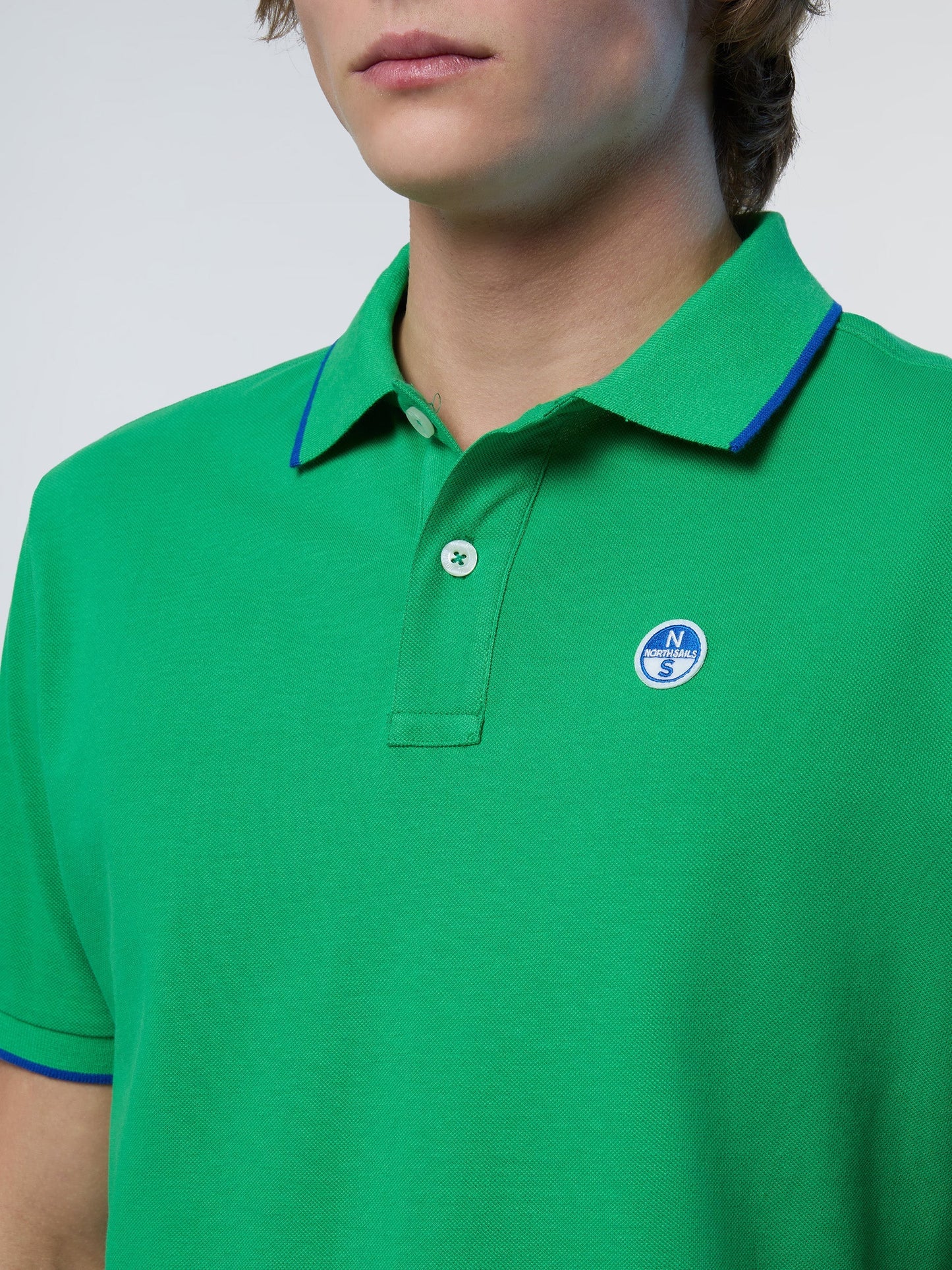 Polo shirt with logo collar
