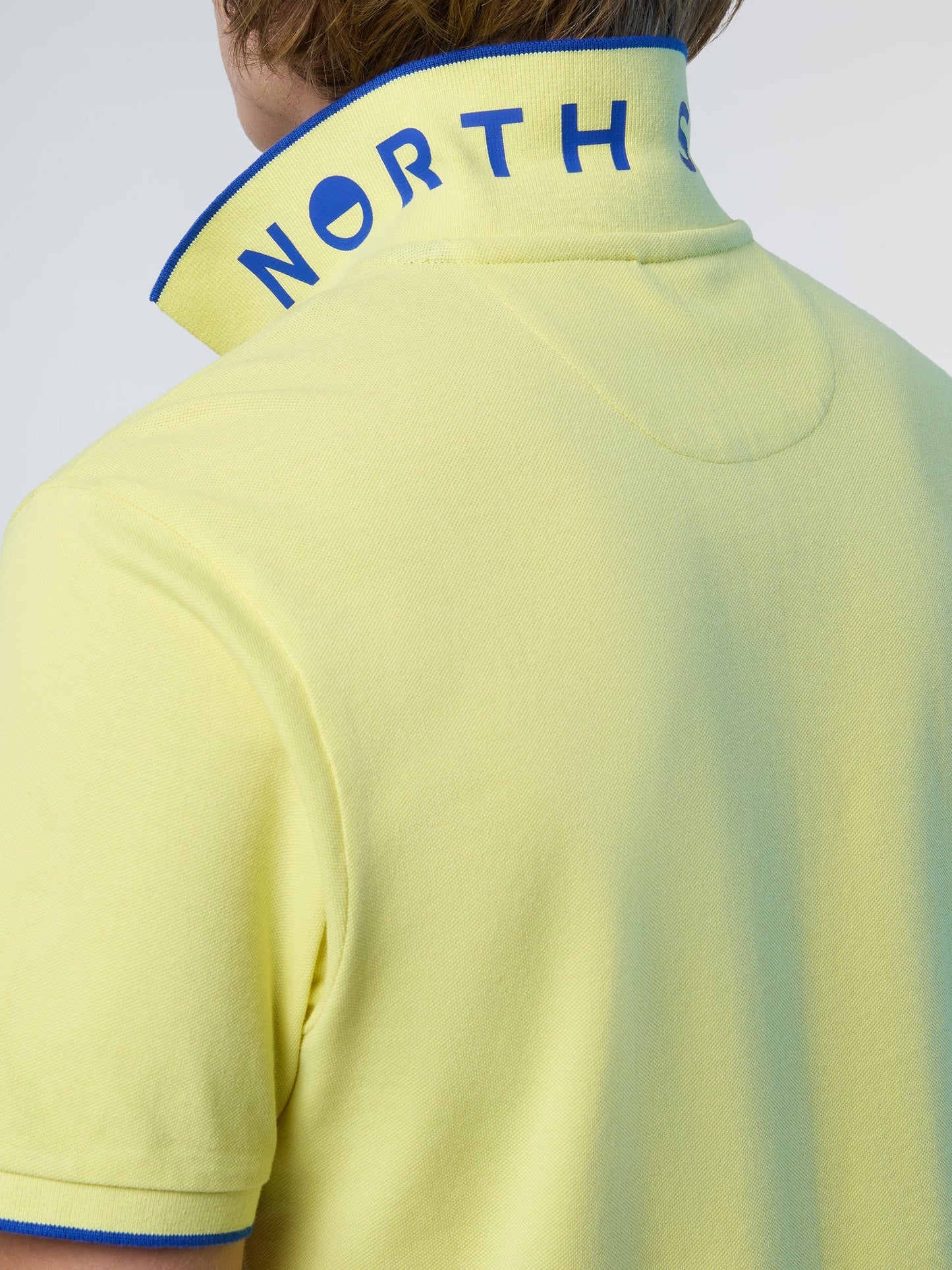 Polo shirt with logo collar