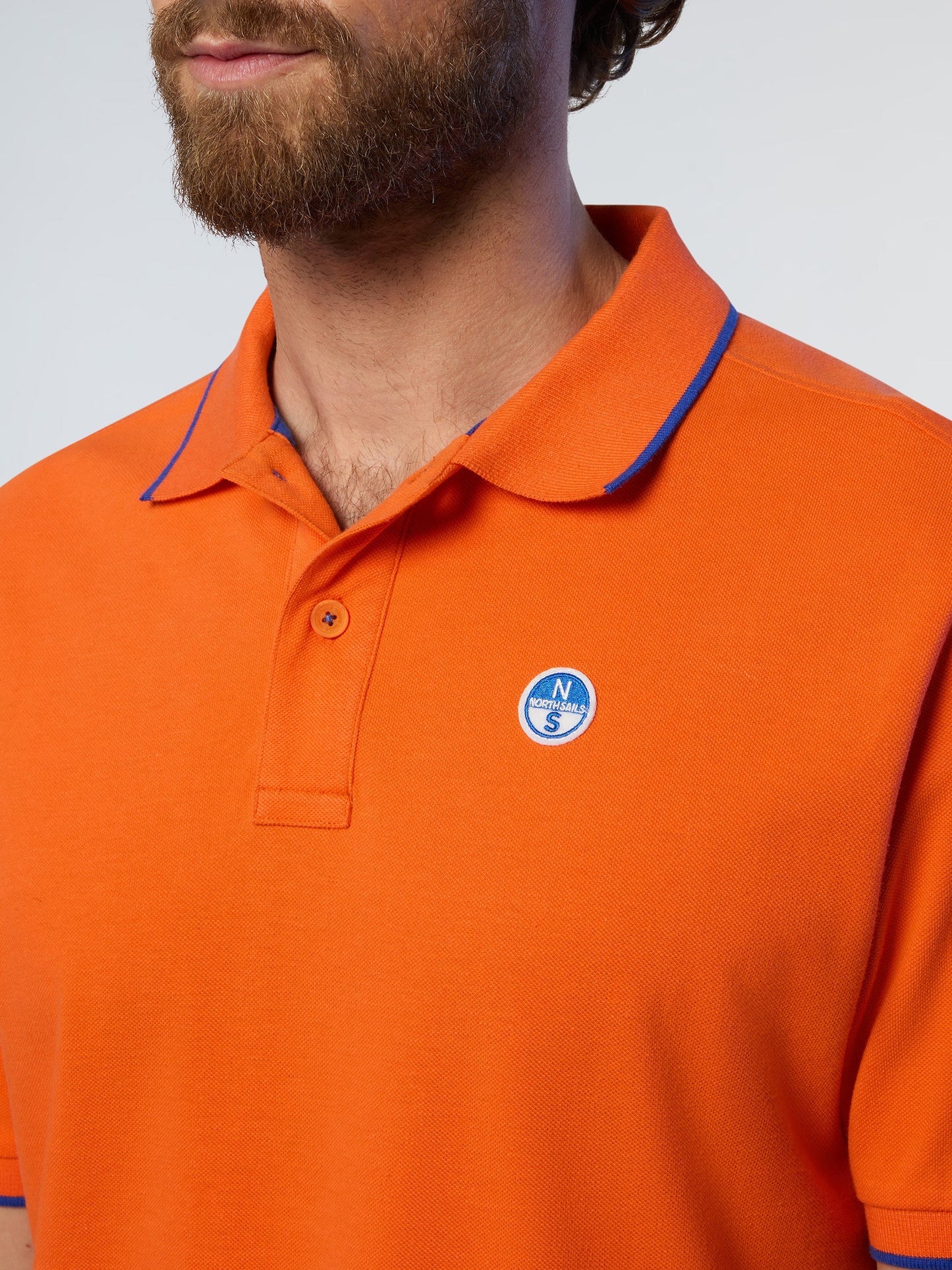 Polo shirt with logo collar
