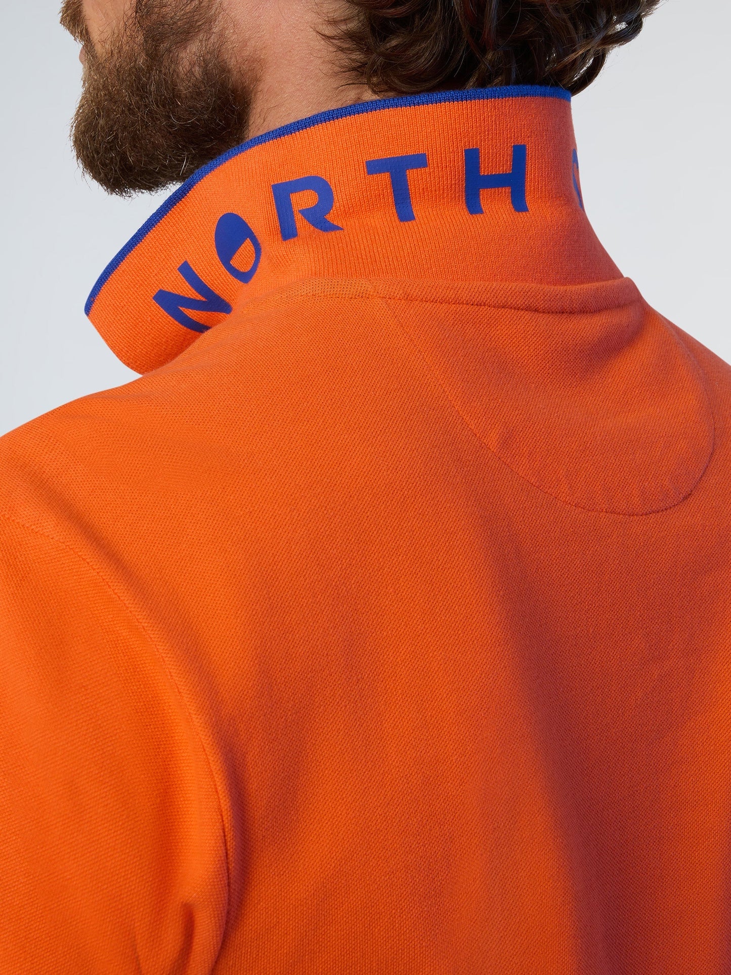 Polo shirt with logo collar