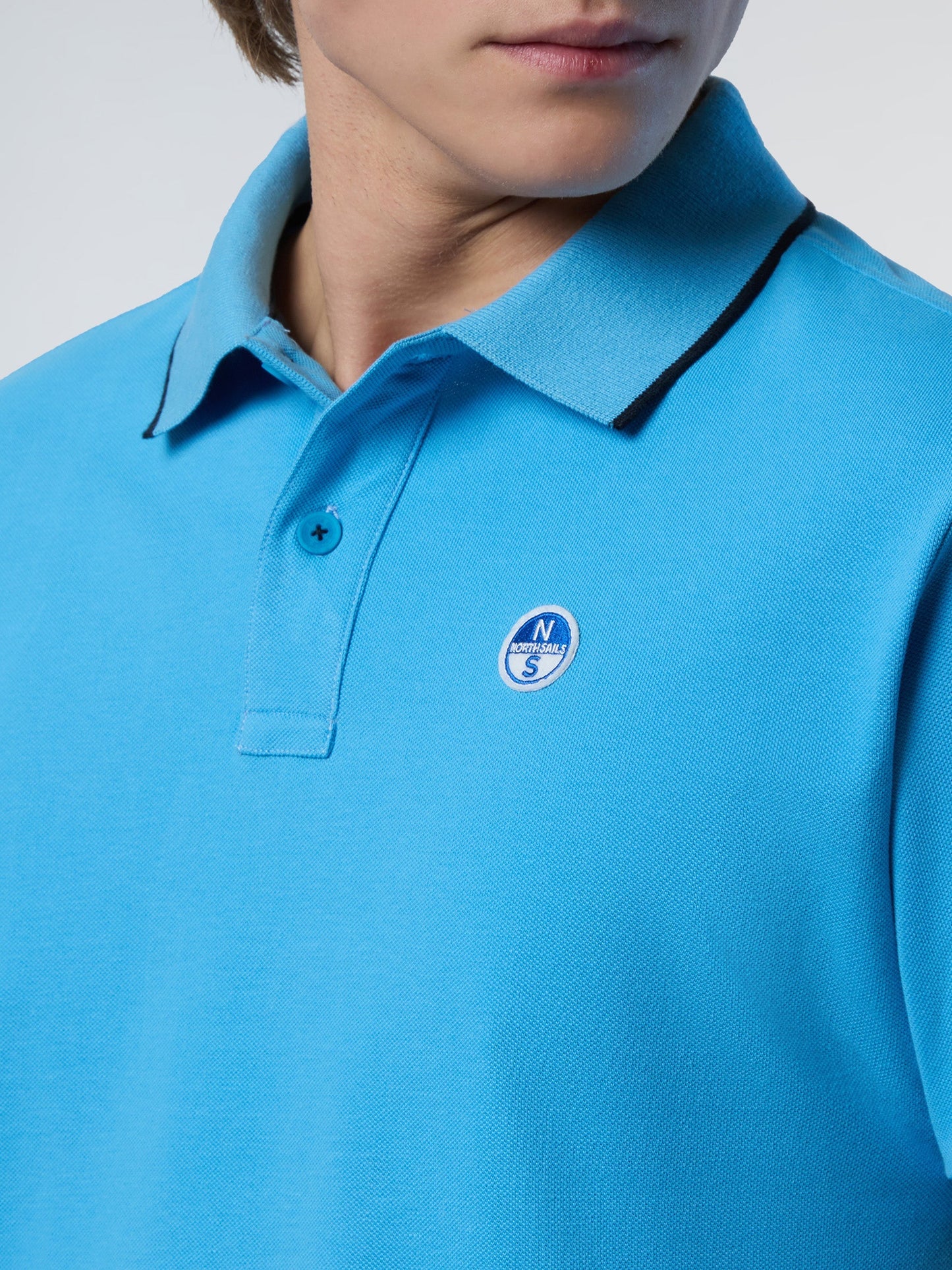Polo shirt with logo collar