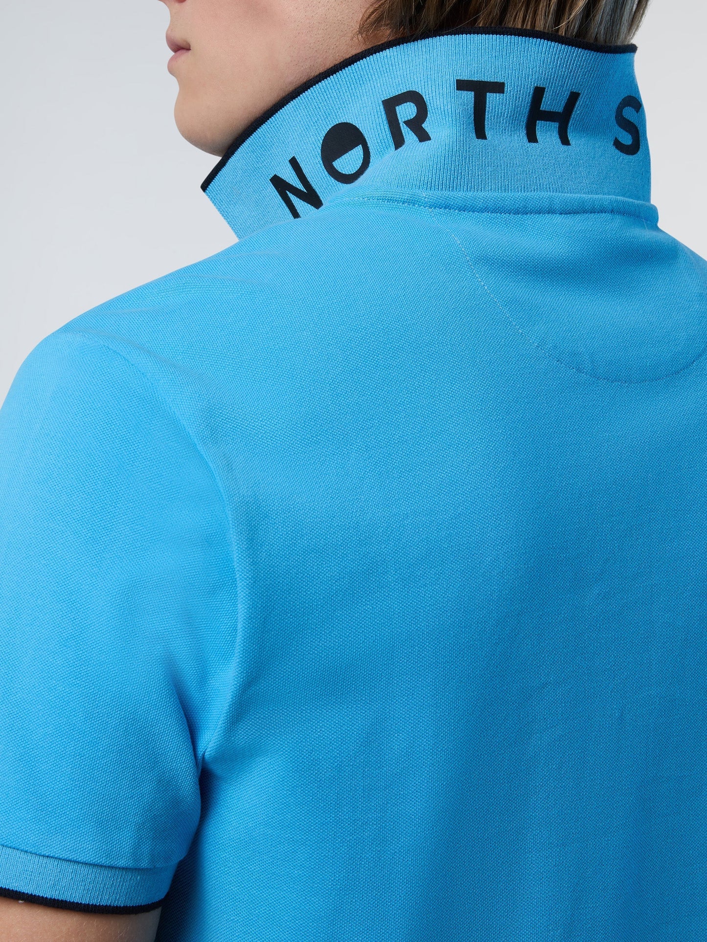 Polo shirt with logo collar
