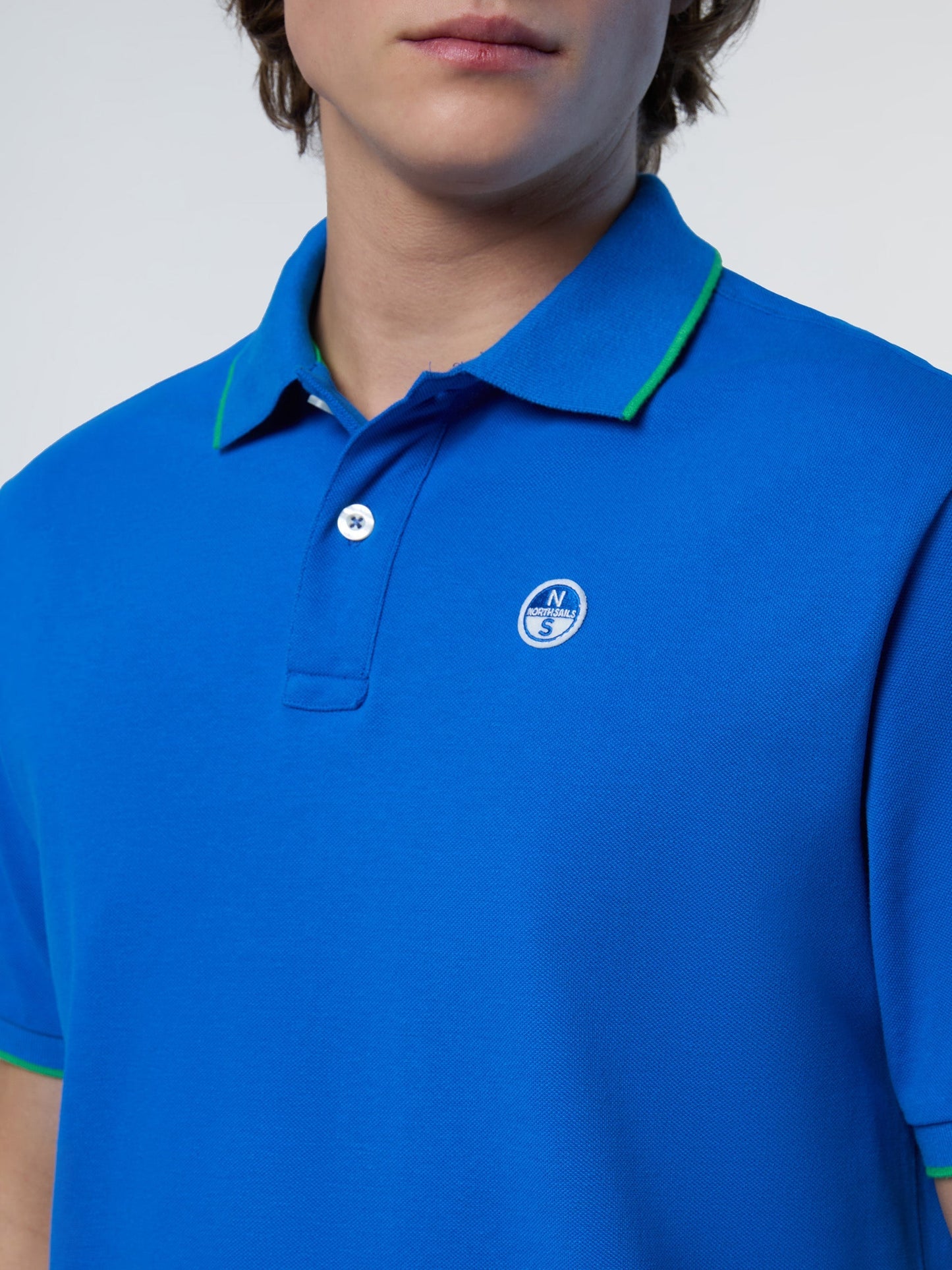Polo shirt with logo collar