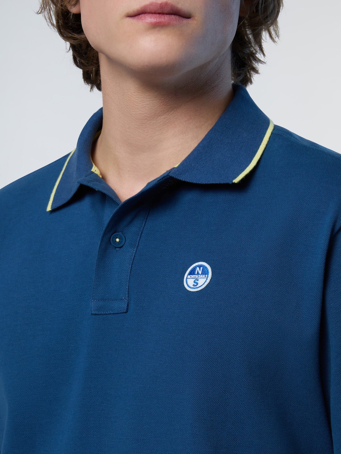 Polo shirt with logo collar