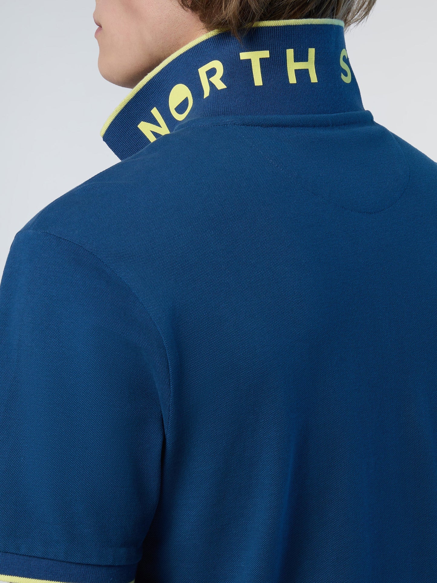 Polo shirt with logo collar