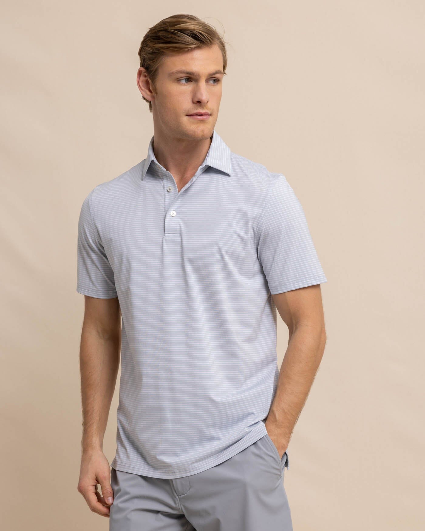 The front view of the Southern Tide brrr-eeze Baytop Stripe Performance Polo by Southern Tide - Platinum Grey