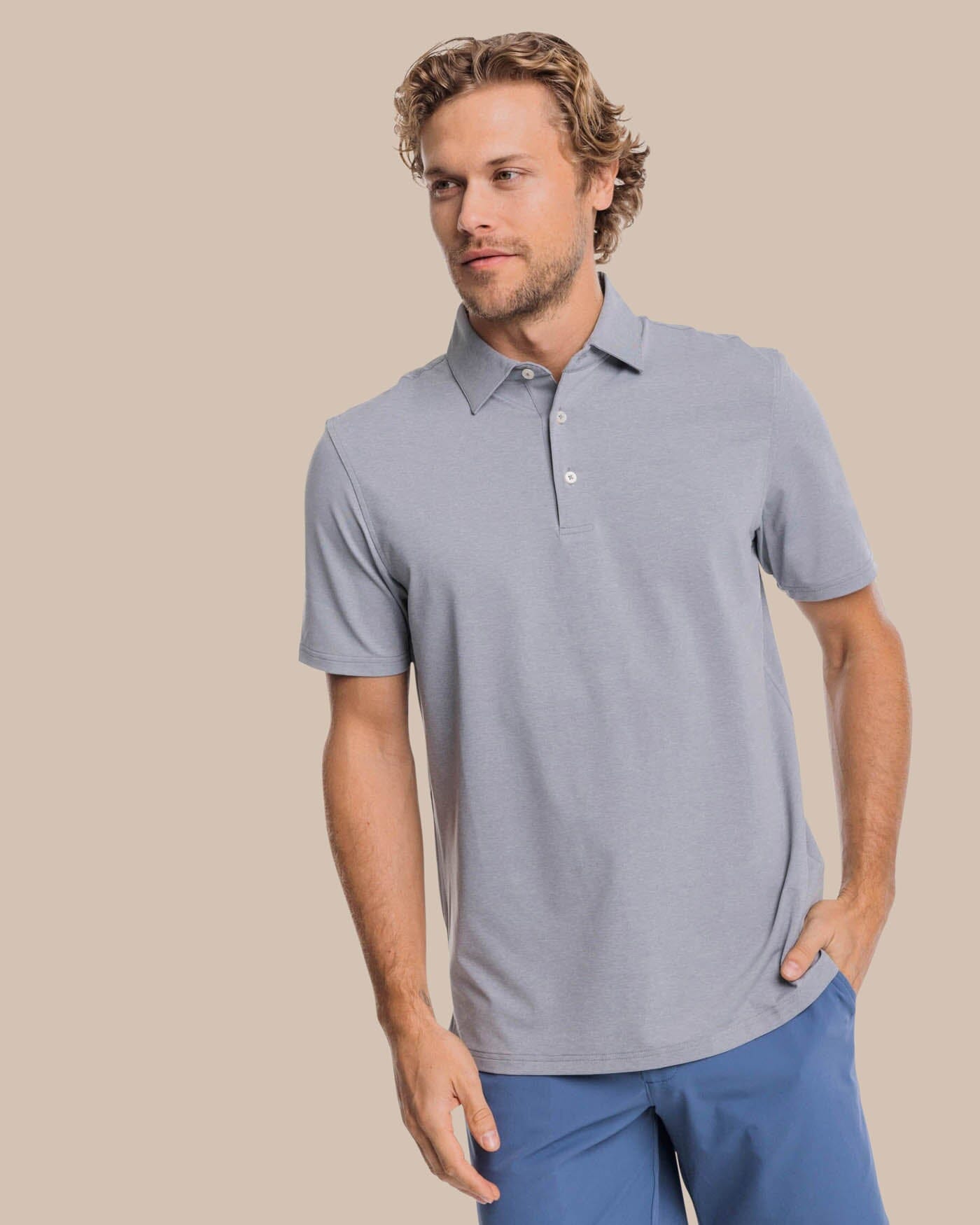 The front view of the brrr掳庐-eeze Heather Performance Polo Shirt by Southern Tide - Heather Steel Grey
